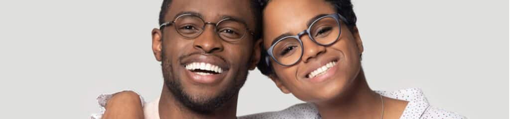 african couple embracing smiling looking at camera posing on grey.jpg s1024x1024wisk20c2ms1C AU Kqm0PpRQGocSRjqQFibsXAY knTGX8l1ys